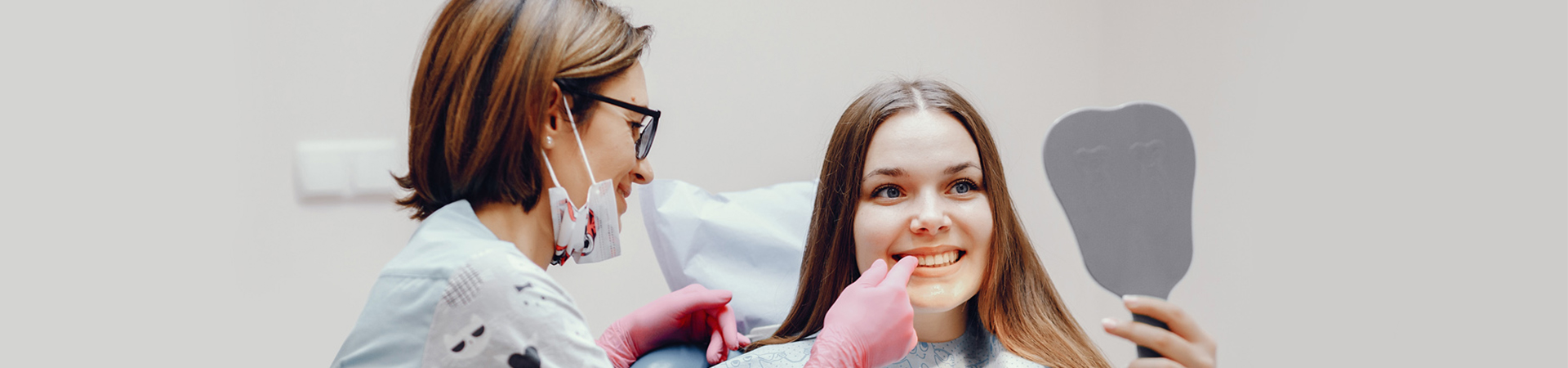 Natick dentist checking patient teeth
